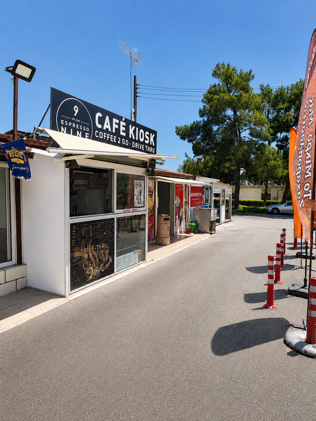 The Nine Drive café kiosk on a sunny day in Psevdas